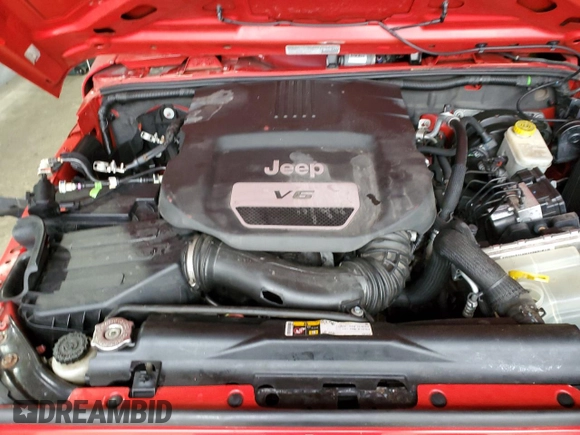 2014 Jeep Wrangler Sport with VIN 1C4AJWAG6EL139619, listed as a Copart auction lot 54935445 with 79,001 mi miles and Salvage title. Bid and sale history available at DreamBid. Image 12.