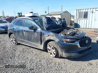 2023 Mazda CX-30 S Premium z VIN 3MVDMBDM7PM519793, wystawiony jako IAAI lot #42184088 z przebiegiem 48 844 mil mil oraz . Historia ofert i sprzedaży dostępna na DreamBid. Obrazek 1.