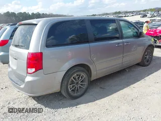 2015 Dodge Grand Caravan American Value with VIN 2C4RDGBG6FR576897, listed as a IAAI auction lot 41780897 with 159,823 mi miles and . Bid and sale history available at DreamBid. Image 4.
