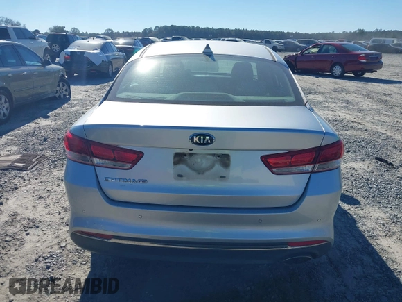 2016 Kia Optima LX with VIN 5XXGT4L37GG015462, listed as a IAAI auction lot 41247091 with 165,755 mi miles and . Bid and sale history available at DreamBid. Image 16.