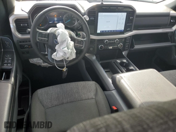 2023 Ford F-150 XL with VIN 1FTEW1C50PKF91124, listed as a Copart auction lot 51538865 with 22,128 mi miles and Salvage title. Bid and sale history available at DreamBid. Image 8.