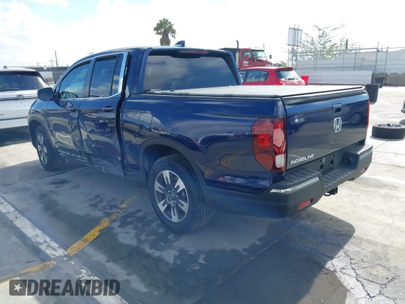 2017 Honda Ridgeline RTL-T with VIN 5FPYK2F68HB001759, listed as a IAAI auction lot 41562343 with 59,633 mi miles and . Bid and sale history available at DreamBid. Image 3.