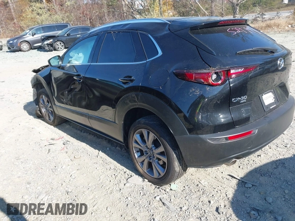2023 Mazda CX-30 2.5 S Premium Package with VIN 3MVDMBDMXPM529797, listed as a IAAI auction lot 41012225 with 26,354 mi miles. Bid and sale history available at carsss.com. Image 3.