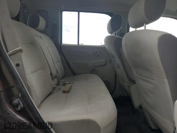 2009 Nissan Cube S z VIN JN8AZ28R39T105396, wystawiony jako Copart lot #57292795 z przebiegiem 94 536 mil mil oraz Tytuł czysty. Historia ofert i sprzedaży dostępna na DreamBid. Obrazek 11.
