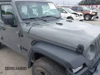 2022 Jeep Wrangler Unlimited Sport S with VIN 1C4HJXDG8NW126143, listed as a IAAI auction lot 42197273 with 44,472 mi miles and . Bid and sale history available at DreamBid. Image 6.