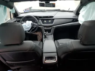 2021 Cadillac XT6 Luxury z VIN 1GYKPAR46MZ132157, wystawiony jako Copart lot #83911054 z przebiegiem 59 473 mil mil oraz Czysty tytuł • Clean title. Historia ofert i sprzedaży dostępna na DreamBid. Obrazek 8.