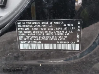 2014 Volkswagen Passat Wolfsburg Ed with VIN 1VWAT7A31EC098634, listed as a IAAI auction lot 41924146 with 80,872 mi miles. Bid and sale history available at carsss.com. Image 9.