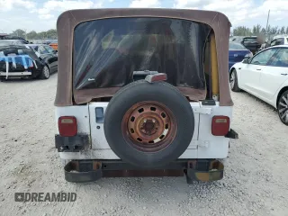 1995 Jeep Wrangler S z VIN 1J4FY19PXSP283293, wystawiony jako Copart lot #55553965 z przebiegiem 178 576 mil mil oraz Czysty tytuł • Clean title. Historia ofert i sprzedaży dostępna na DreamBid. Obrazek 6.