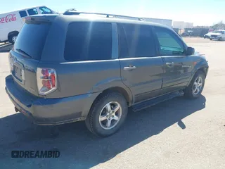 2007 Honda Pilot EX-L with VIN 2HKYF185X7H511879, listed as a IAAI auction lot 41872915 with 232,543 mi miles. Bid and sale history available at carsss.com. Image 4.