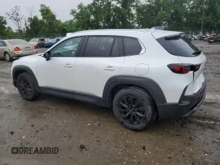 2025 Mazda CX-50 S Premium z VIN 7MMVABDM9SN331032, wystawiony jako Copart lot #60797015 z przebiegiem 9 572 mil mil oraz Nie do naprawy • Non repairable. Historia ofert i sprzedaży dostępna na DreamBid. Obrazek 2.