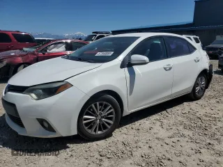 2014 Toyota Corolla L with VIN 5YFBURHEXEP028984, listed as a Copart auction lot 57340885 with 204,197 mi miles and Salvage title. Bid and sale history available at DreamBid. Image 1.
