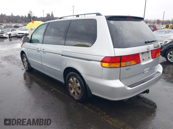 2004 Honda Odyssey EX-L with VIN 5FNRL18934B016420, listed as a IAAI auction lot 41473237 with 188,659 mi miles and . Bid and sale history available at DreamBid. Image 3.