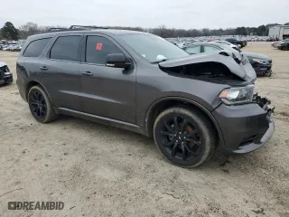 2020 Dodge Durango GT with VIN 1C4RDHDG3LC118659, listed as a Copart auction lot 87187394 with 76,937 mi miles and Salvage Title. Bid and sale history available at carsss.com. Image 4.