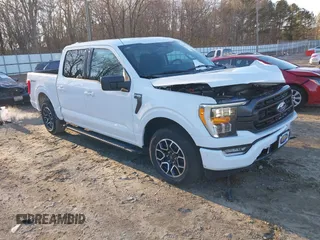 2023 Ford F-150 XL with VIN 1FTEW1CP8PKG14490, listed as a IAAI auction lot 41270219 with 8,033 mi miles. Bid and sale history available at carsss.com. Image 1.