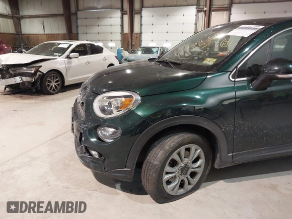 2016 FIAT 500X Lounge with VIN ZFBCFYDT1GP470721, listed as a IAAI auction lot 41293223 with 104,478 mi miles and . Bid and sale history available at DreamBid. Image 17.