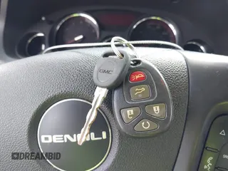2012 GMC Acadia Denali with VIN 1GKKVTEDXCJ210342, listed as a IAAI auction lot 42549900 with 241,440 mi miles and . Bid and sale history available at DreamBid. Image 11.
