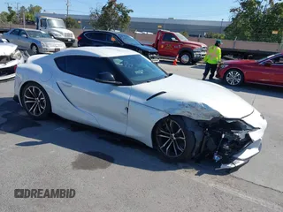 2021 Toyota Supra 2.0 with VIN WZ1DB2C01MW039946, listed as a IAAI auction lot 42519516 with 21,073 mi miles and . Bid and sale history available at DreamBid. Image 1.