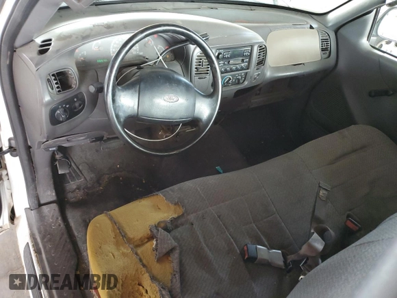 2003 Ford F-150 XL with VIN 1FTRF17243NB73840, listed as a Copart auction lot 58356935 with 332,670 mi miles and Salvage title. Bid and sale history available at DreamBid. Image 8.
