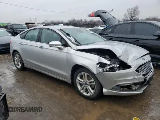 2018 Ford Fusion SE z VIN 3FA6P0H79JR270777, wystawiony jako Copart lot #45319755 z przebiegiem 69 152 mil mil oraz Szkoda całkowita • Salvage title. Historia ofert i sprzedaży dostępna na DreamBid. Obrazek 4.
