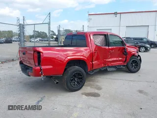 2022 Toyota Tacoma SR with VIN 3TYAX5GN1NT039848, listed as a IAAI auction lot 41210811 with 93,670 mi miles and . Bid and sale history available at DreamBid. Image 4.