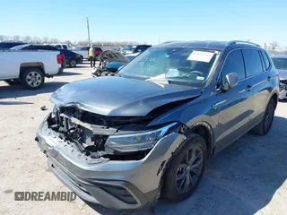 2023 Volkswagen Tiguan SE with VIN 3VV3B7AX5PM142378, listed as a IAAI auction lot 41835204 with 13,670 mi miles and . Bid and sale history available at DreamBid. Image 2.