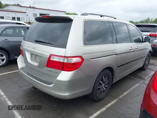 2005 Honda Odyssey EX with VIN 5FNRL38445B412759, listed as a IAAI auction lot 41975304 with 133,221 mi miles. Bid and sale history available at carsss.com. Image 4.