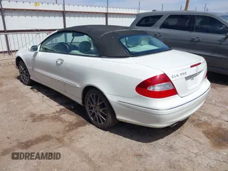 2007 Mercedes-Benz CLK 3.5L with VIN WDBTK56F47T075999, listed as a IAAI auction lot 41915608 with 164,654 mi miles. Bid and sale history available at carsss.com. Image 3.