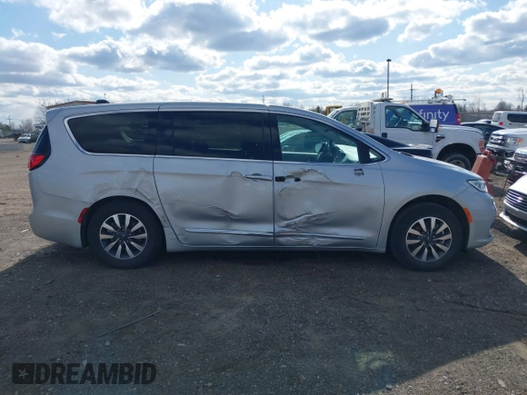 2023 Chrysler Pacifica Hybrid Limited with VIN 2C4RC1S78PR551260, listed as a IAAI auction lot 41992752 with 55,136 mi miles and . Bid and sale history available at DreamBid. Image 13.
