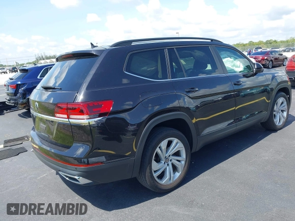 2021 Volkswagen Atlas SE with VIN 1V2WR2CA1MC607768, listed as a IAAI auction lot 42518885 with 49,286 mi miles and . Bid and sale history available at DreamBid. Image 4.
