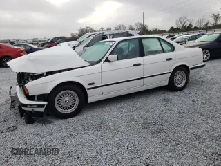 1995 BMW 5 Series 525i z VIN WBAHD6326SGK83552, wystawiony jako Copart lot #45245825 z przebiegiem 181 607 mil mil oraz Szkoda całkowita • Salvage title. Historia ofert i sprzedaży dostępna na DreamBid. Obrazek 1.
