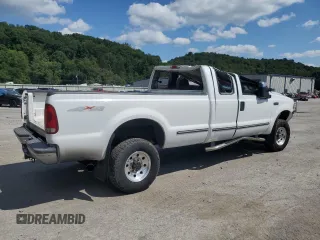 1999 Ford Super Duty F-250 XL with VIN 1FTNX21F3XEA71139, listed as a Copart auction lot 67062114 with 203,233 mi miles and Salvage Title. Bid and sale history available at carsss.com. Image 3.