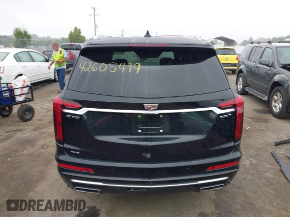 2024 Cadillac XT6 AWD Luxury with VIN 1GYKPBR45RZ750986, listed as a IAAI auction lot 42605419 with 50,929 mi miles and . Bid and sale history available at DreamBid. Image 17.
