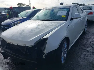 2012 Cadillac CTS Premium with VIN 1G6DP5E3XC0144157, listed as a IAAI auction lot 41311350 with 96,042 mi miles and . Bid and sale history available at DreamBid. Image 13.