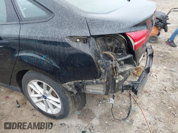 2018 Ford Focus SE with VIN 1FADP3F2XJL206441, listed as a IAAI auction lot 42341641 with 189,260 mi miles and . Bid and sale history available at DreamBid. Image 21.