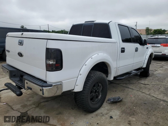 2004 Ford F-150 XLT with VIN 1FTPW14534KD15619, listed as a Copart auction lot 60589845 with 151,793 mi miles and Salvage title. Bid and sale history available at DreamBid. Image 3.