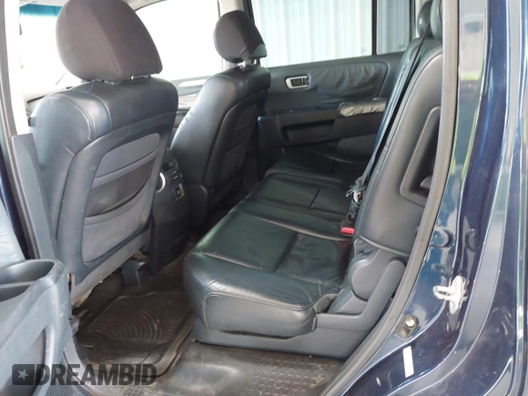 2009 Honda Pilot EX-L with VIN 5FNYF38509B012425, listed as a IAAI auction lot 42588334 with 253,011 mi miles and . Bid and sale history available at DreamBid. Image 8.