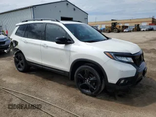 2019 Honda Passport Touring with VIN 5FNYF8H97KB501488, listed as a Copart auction lot 59269085 with 158,006 mi miles and Salvage title. Bid and sale history available at DreamBid. Image 4.