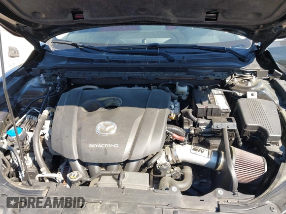 2020 Mazda 6 Sport with VIN JM1GL1UM7L1526598, listed as a IAAI auction lot 41888418 with 97,568 mi miles and . Bid and sale history available at DreamBid. Image 10.