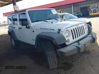 2015 Jeep Wrangler Unlimited Rubicon with VIN 1C4BJWFG9FL744927, listed as a IAAI auction lot 42169740 with 106,352 mi miles and . Bid and sale history available at DreamBid. Image 1.