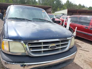 2003 Ford F-150 XL with VIN 1FTRX18L63NB59927, listed as a IAAI auction lot 41842559 with 1 mi miles. Bid and sale history available at carsss.com. Image 6.