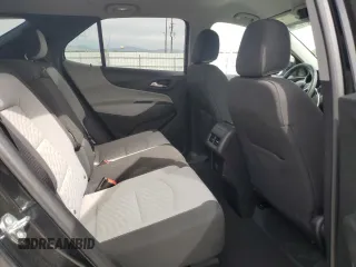 2018 Chevrolet Equinox LT z VIN 2GNAXSEV5J6135619, wystawiony jako Copart lot #56678645 z przebiegiem 77 019 mil mil oraz Szkoda całkowita • Salvage title. Historia ofert i sprzedaży dostępna na DreamBid. Obrazek 11.