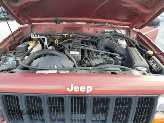 1998 Jeep Cherokee Sport with VIN 1J4FT68S4WL270134, listed as a Copart auction lot 51019695 with 246,945 mi miles and Non Repairable. Bid and sale history available at carsss.com. Image 11.