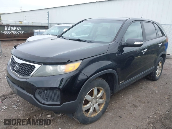 2011 Kia Sorento LX with VIN 5XYKTCA17BG172032, listed as a IAAI auction lot 42227728 with 133,681 mi miles and . Bid and sale history available at carsss.com. Image 2.