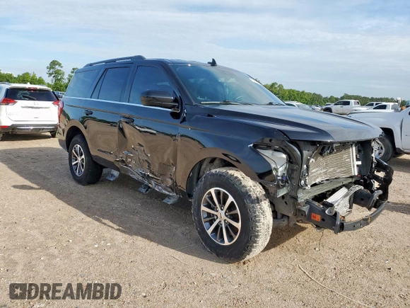 2021 Ford Expedition XLT with VIN 1FMJU1HT9MEA53247, listed as a Copart auction lot 64267655 with 53,162 mi miles and Salvage title. Bid and sale history available at DreamBid. Image 4.