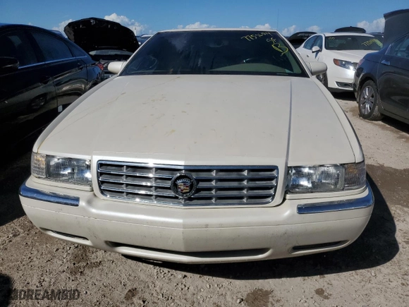 2000 Cadillac Eldorado with VIN 1G6EL12Y0YB704658, listed as a Copart auction lot 77596814 with 0 mi miles and Non Repairable. Bid and sale history available at carsss.com. Image 5.