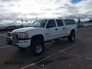 2005 GMC Sierra 2500HD SLE z VIN 1GTHK23245F887905, wystawiony jako IAAI lot #41680146 z przebiegiem 104 775 mil mil oraz . Historia ofert i sprzedaży dostępna na DreamBid. Obrazek 2.