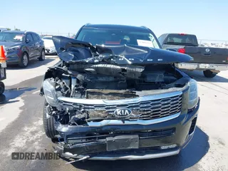 2020 Kia Telluride SX with VIN 5XYP54HC8LG075209, listed as a IAAI auction lot 42000202 with 107,590 mi miles and . Bid and sale history available at DreamBid. Image 6.