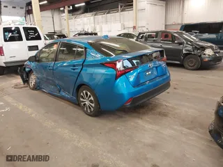 2022 Toyota Prius LE with VIN JTDL9MFU8N3032821, listed as a IAAI auction lot 40502056 with 70,009 mi miles. Bid and sale history available at carsss.com. Image 3.