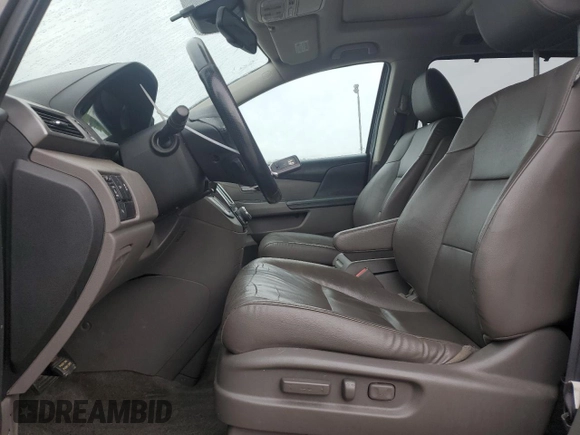 2015 Honda Odyssey Touring Elite with VIN 5FNRL5H95FB117985, listed as a Copart auction lot 57178695 with 199,757 mi miles and Non repairable. Bid and sale history available at DreamBid. Image 7.