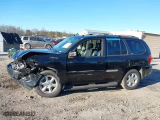 2005 GMC Envoy SLE with VIN 1GKDS13S152246568, listed as a IAAI auction lot 41293887 with 315,882 mi miles. Bid and sale history available at carsss.com. Image 14.